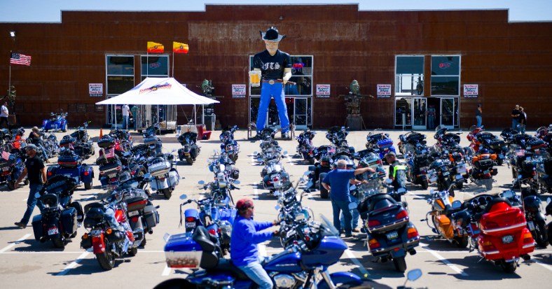 A motorcycle rider outside the Full Throttle Saloon during the 80th Annual Sturgis Motorcycle Rally in Sturgis