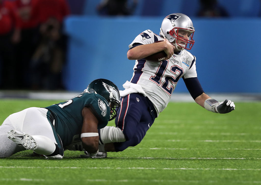 Tom Brady tackled