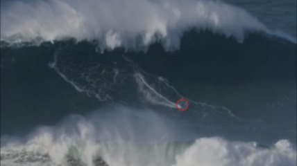 watch-surfer-rides-ginormous-100-foot-wave-to-break-world-recor.hashed.63a2ad7d.desktop.story.homePage