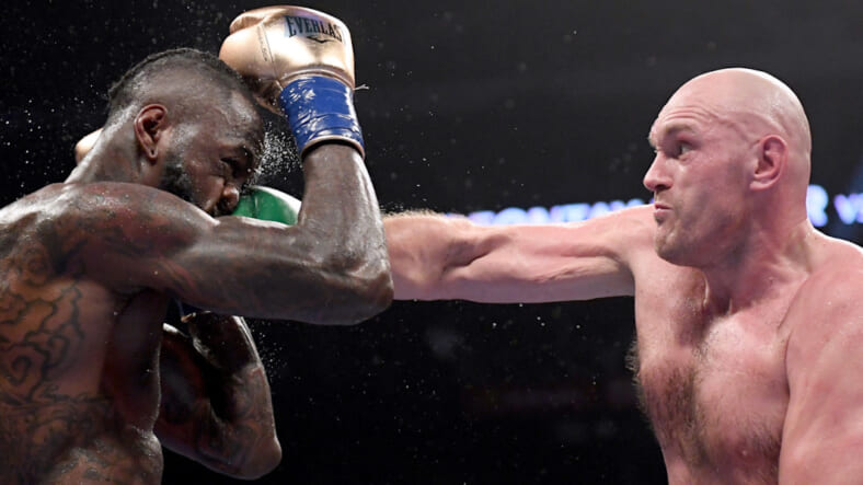 Tyson Fury connects with right hand in classic 3rd fight with Deontay Wilder