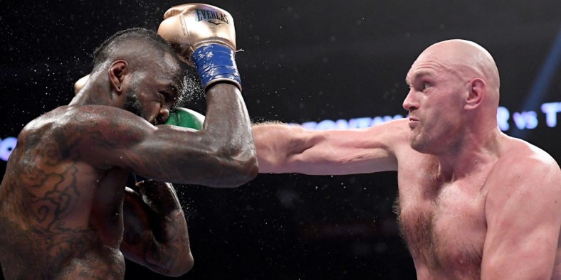 Tyson Fury connects with right hand in classic 3rd fight with Deontay Wilder