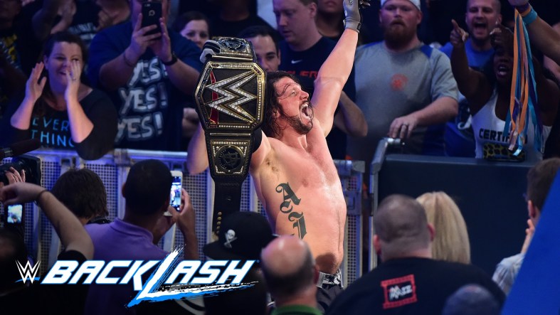AJ-Styles-raises-his-hands-high-as-the-new-WWE-World-Champion-Backlash-2016.jpeg