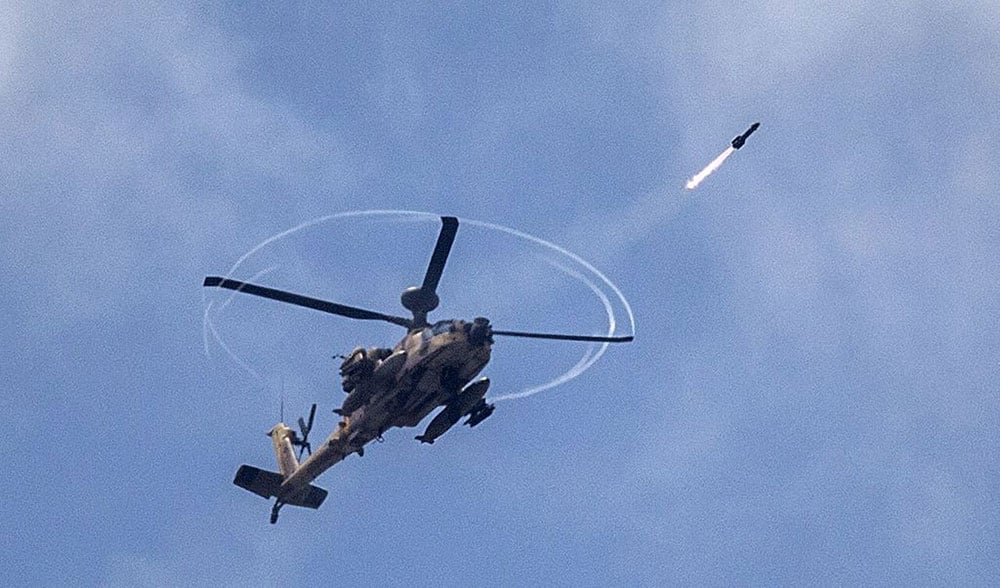 apache-gunship-attack.jpg Apache helicopter in action. (Photo: Jack Guez/Getty Images)