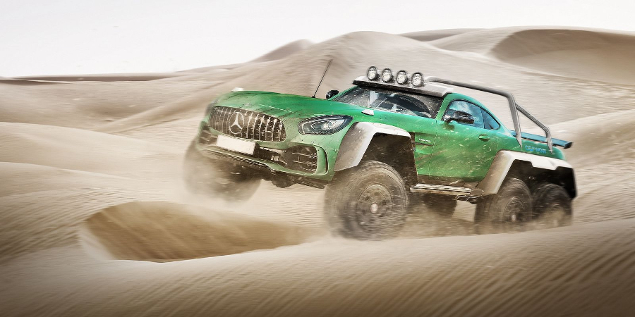 Blasting through the dunes, presumably outside Dubai (Photo: Carwow)