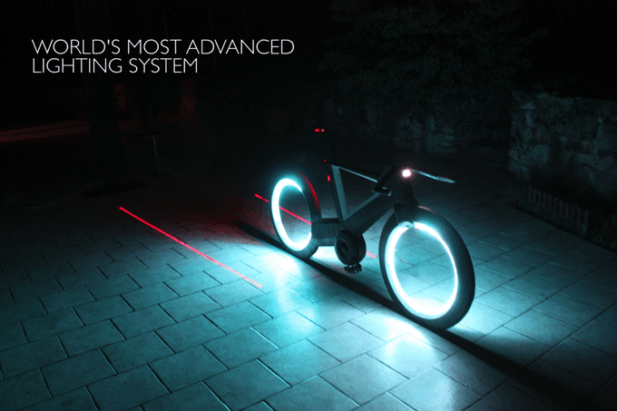 Cyclotron bicycle - lasers.gif Its wheels and lane-defining lasers light up (Photo: Cyclotron Cycles)