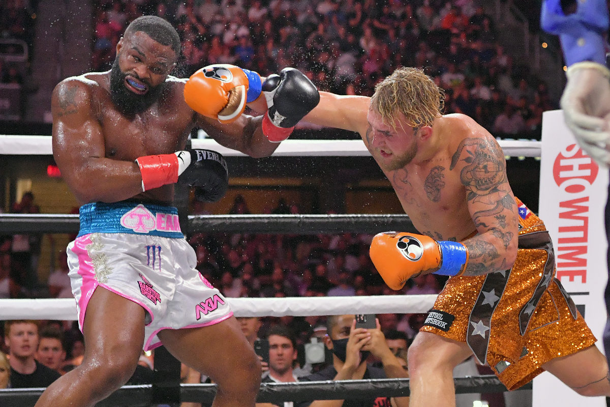 jake-paul-tyron-woodley-main-GettyImages-1337175637 Jake Paul fights Tyron Woodley in during Showtime pay-per-view event at Rocket Mortgage Fieldhouse on August 29, 2021.