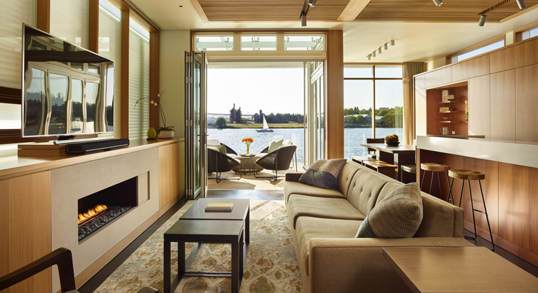 Vandeventer Carlander Seattle Floating Home - living room reverse.jpg A reverse angle shows the living room's view (Photo: Benjamin Benschneider Photography)