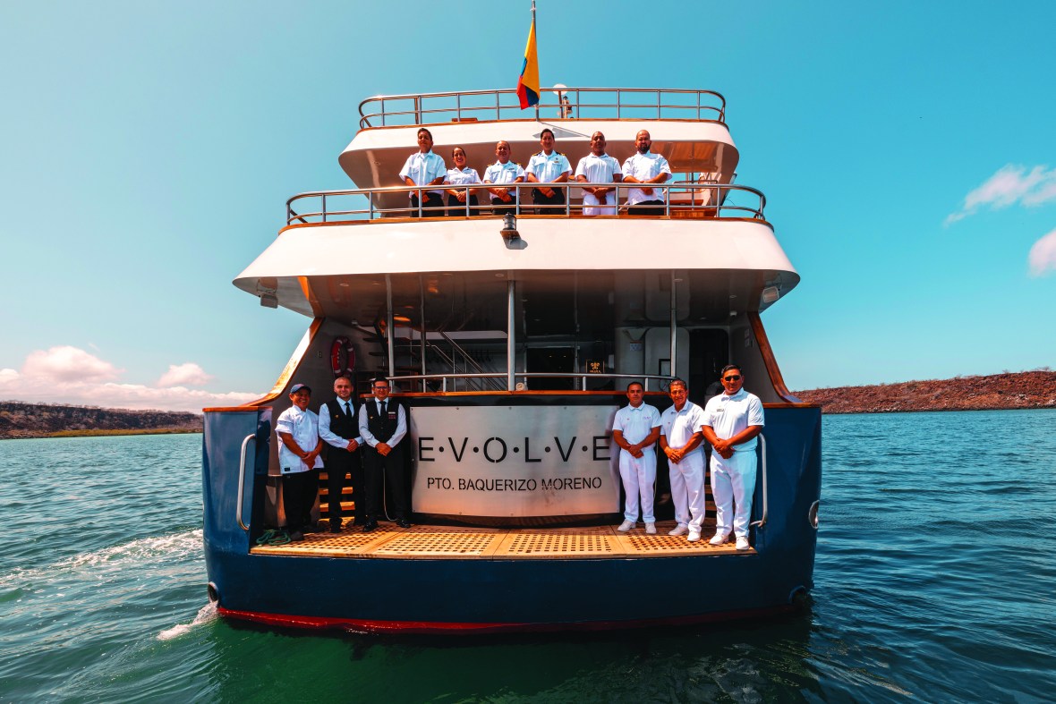 Crew On The Stern Exploring Gorgeous Galápagos Aboard The Ecoventura 'Evolve' Yacht